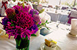 Special event planning showing red flower centrepiece